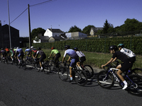 Members of the Mexican triathlon team are cycling during their training for the Paris Olympic Games in Lugo, Galicia, Spain, on July 23, 202...