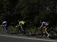 Members of the Mexican triathlon team are cycling during their training for the Paris Olympic Games in Lugo, Galicia, Spain, on July 23, 202...