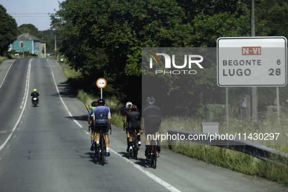 Members of the Mexican triathlon team are cycling during their training for the Paris Olympic Games in Lugo, Galicia, Spain, on July 23, 202...