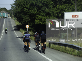 Members of the Mexican triathlon team are cycling during their training for the Paris Olympic Games in Lugo, Galicia, Spain, on July 23, 202...