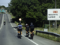 Members of the Mexican triathlon team are cycling during their training for the Paris Olympic Games in Lugo, Galicia, Spain, on July 23, 202...