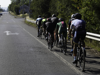 Members of the Mexican triathlon team are cycling during their training for the Paris Olympic Games in Lugo, Galicia, Spain, on July 23, 202...