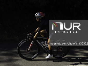 Rosa Maria Tapia Vidal is cycling during her training for the Paris Olympic Games in Lugo, Galicia, Spain, on July 23, 2024. (