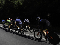 Members of the Mexican triathlon team are cycling during their training for the Paris Olympic Games in Lugo, Galicia, Spain, on July 23, 202...