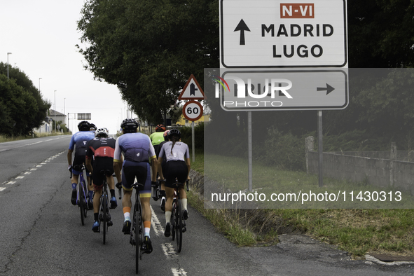 Members of the Mexican triathlon team are cycling during their training for the Paris Olympic Games in Lugo, Galicia, Spain, on July 23, 202...