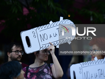 Madrid residents are demonstrating against the City Council's decision to cut down the trees in Plaza de Santa Ana to expand an underground...