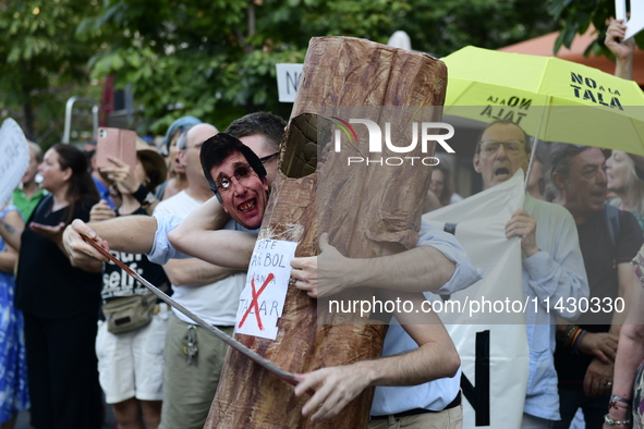 Madrid residents are demonstrating against the City Council's decision to cut down the trees in Plaza de Santa Ana to expand an underground...