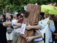 Madrid residents are demonstrating against the City Council's decision to cut down the trees in Plaza de Santa Ana to expand an underground...