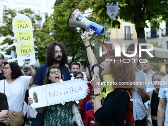 Madrid residents are demonstrating against the City Council's decision to cut down the trees in Plaza de Santa Ana to expand an underground...