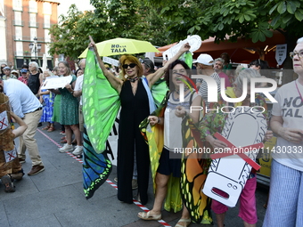 Madrid residents are demonstrating against the City Council's decision to cut down the trees in Plaza de Santa Ana to expand an underground...