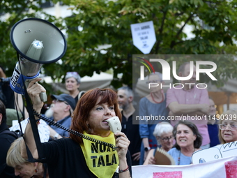 Madrid residents are demonstrating against the City Council's decision to cut down the trees in Plaza de Santa Ana to expand an underground...