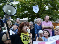 Madrid residents are demonstrating against the City Council's decision to cut down the trees in Plaza de Santa Ana to expand an underground...