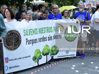 Madrid residents are demonstrating against the City Council's decision to cut down the trees in Plaza de Santa Ana to expand an underground...