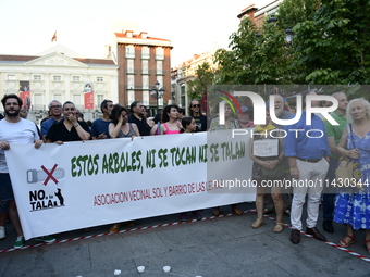 Madrid residents are demonstrating against the City Council's decision to cut down the trees in Plaza de Santa Ana to expand an underground...