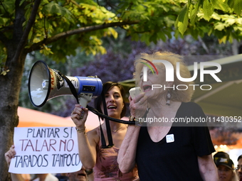 Madrid residents are demonstrating against the City Council's decision to cut down the trees in Plaza de Santa Ana to expand an underground...