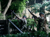 Soldiers of a military detachment are firing shots during the ceremony in Limassol, Cyprus, on July 22, 2024. The AHEPA (American Hellenic E...