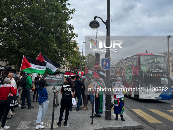 A demonstration is taking place in support of Palestine to stop the genocide of Palestinians and to exclude Israel from the Paris Olympics a...