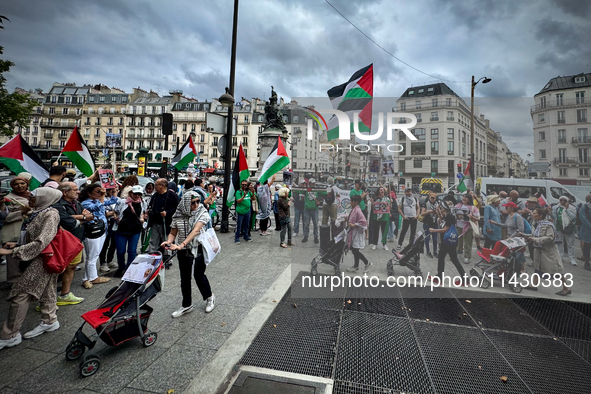 A demonstration is taking place in support of Palestine to stop the genocide of Palestinians and to exclude Israel from the Paris Olympics a...