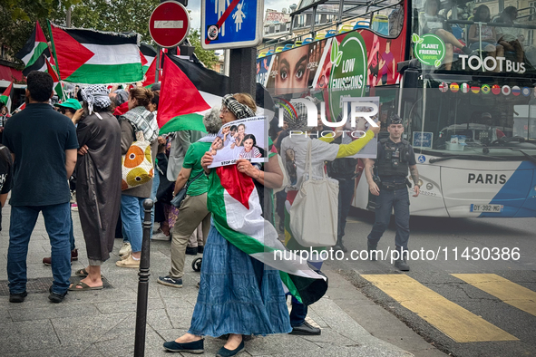 A demonstration is taking place in support of Palestine to stop the genocide of Palestinians and to exclude Israel from the Paris Olympics a...