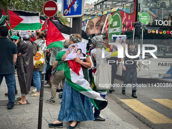 A demonstration is taking place in support of Palestine to stop the genocide of Palestinians and to exclude Israel from the Paris Olympics a...