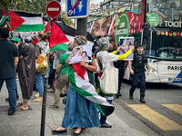 A demonstration is taking place in support of Palestine to stop the genocide of Palestinians and to exclude Israel from the Paris Olympics a...