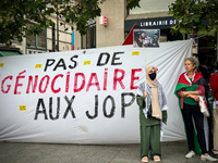 A demonstration is taking place in support of Palestine to stop the genocide of Palestinians and to exclude Israel from the Paris Olympics a...