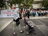 A demonstration is taking place in support of Palestine to stop the genocide of Palestinians and to exclude Israel from the Paris Olympics a...