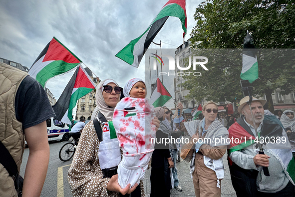 A demonstration is taking place in support of Palestine to stop the genocide of Palestinians and to exclude Israel from the Paris Olympics a...