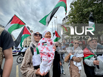 A demonstration is taking place in support of Palestine to stop the genocide of Palestinians and to exclude Israel from the Paris Olympics a...