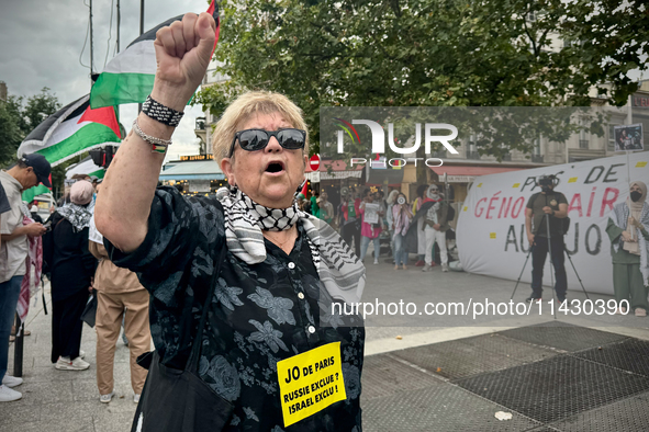 A demonstration is taking place in support of Palestine to stop the genocide of Palestinians and to exclude Israel from the Paris Olympics a...