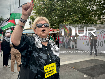 A demonstration is taking place in support of Palestine to stop the genocide of Palestinians and to exclude Israel from the Paris Olympics a...