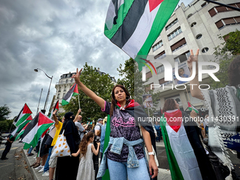 A demonstration is taking place in support of Palestine to stop the genocide of Palestinians and to exclude Israel from the Paris Olympics a...