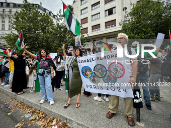 A demonstration is taking place in support of Palestine to stop the genocide of Palestinians and to exclude Israel from the Paris Olympics a...