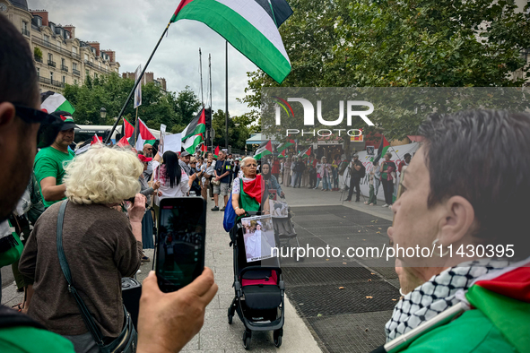 A demonstration is taking place in support of Palestine to stop the genocide of Palestinians and to exclude Israel from the Paris Olympics a...