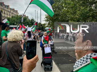 A demonstration is taking place in support of Palestine to stop the genocide of Palestinians and to exclude Israel from the Paris Olympics a...