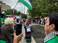 A demonstration is taking place in support of Palestine to stop the genocide of Palestinians and to exclude Israel from the Paris Olympics a...