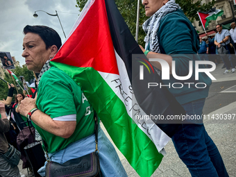 A demonstration is taking place in support of Palestine to stop the genocide of Palestinians and to exclude Israel from the Paris Olympics a...