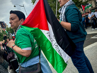 A demonstration is taking place in support of Palestine to stop the genocide of Palestinians and to exclude Israel from the Paris Olympics a...