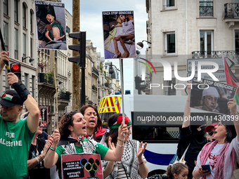 A demonstration is taking place in support of Palestine to stop the genocide of Palestinians and to exclude Israel from the Paris Olympics a...