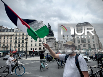 A demonstration is taking place in support of Palestine to stop the genocide of Palestinians and to exclude Israel from the Paris Olympics a...