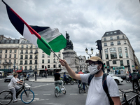 A demonstration is taking place in support of Palestine to stop the genocide of Palestinians and to exclude Israel from the Paris Olympics a...