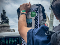 A demonstration is taking place in support of Palestine to stop the genocide of Palestinians and to exclude Israel from the Paris Olympics a...