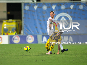 Players are in action during the second phase of the UEFA Champions League Qualification 2024-2025 match between UD Santa Coloma and FC Midt...