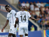 Players are in action during the second phase of the UEFA Champions League Qualification 2024-2025 match between UD Santa Coloma and FC Midt...