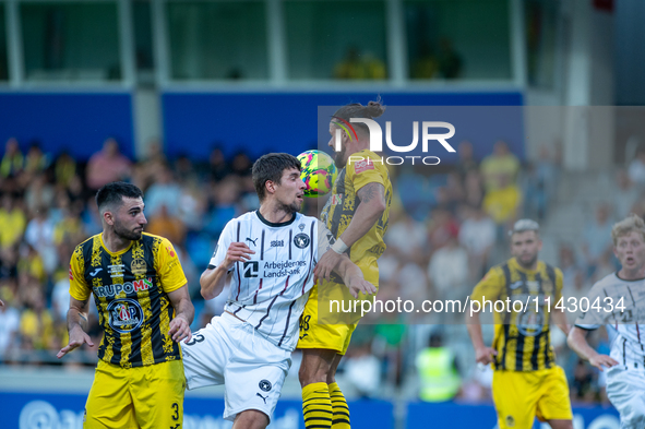 Players are in action during the second phase of the UEFA Champions League Qualification 2024-2025 match between UD Santa Coloma and FC Midt...