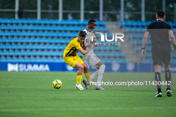 Players are in action during the second phase of the UEFA Champions League Qualification 2024-2025 match between UD Santa Coloma and FC Midt...