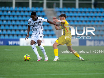 Players are in action during the second phase of the UEFA Champions League Qualification 2024-2025 match between UD Santa Coloma and FC Midt...