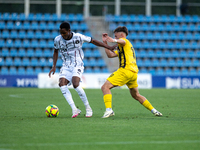 Players are in action during the second phase of the UEFA Champions League Qualification 2024-2025 match between UD Santa Coloma and FC Midt...