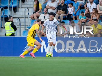 Aral Simsir of FC Midtjylland is in action during the second phase of the UEFA Champions League Qualification 2024-2025 match between UD San...