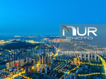 The West Coast New Area, a state-level new area, is shining brightly in Qingdao, China, on July 23, 2024. With the 34th Qingdao Internationa...